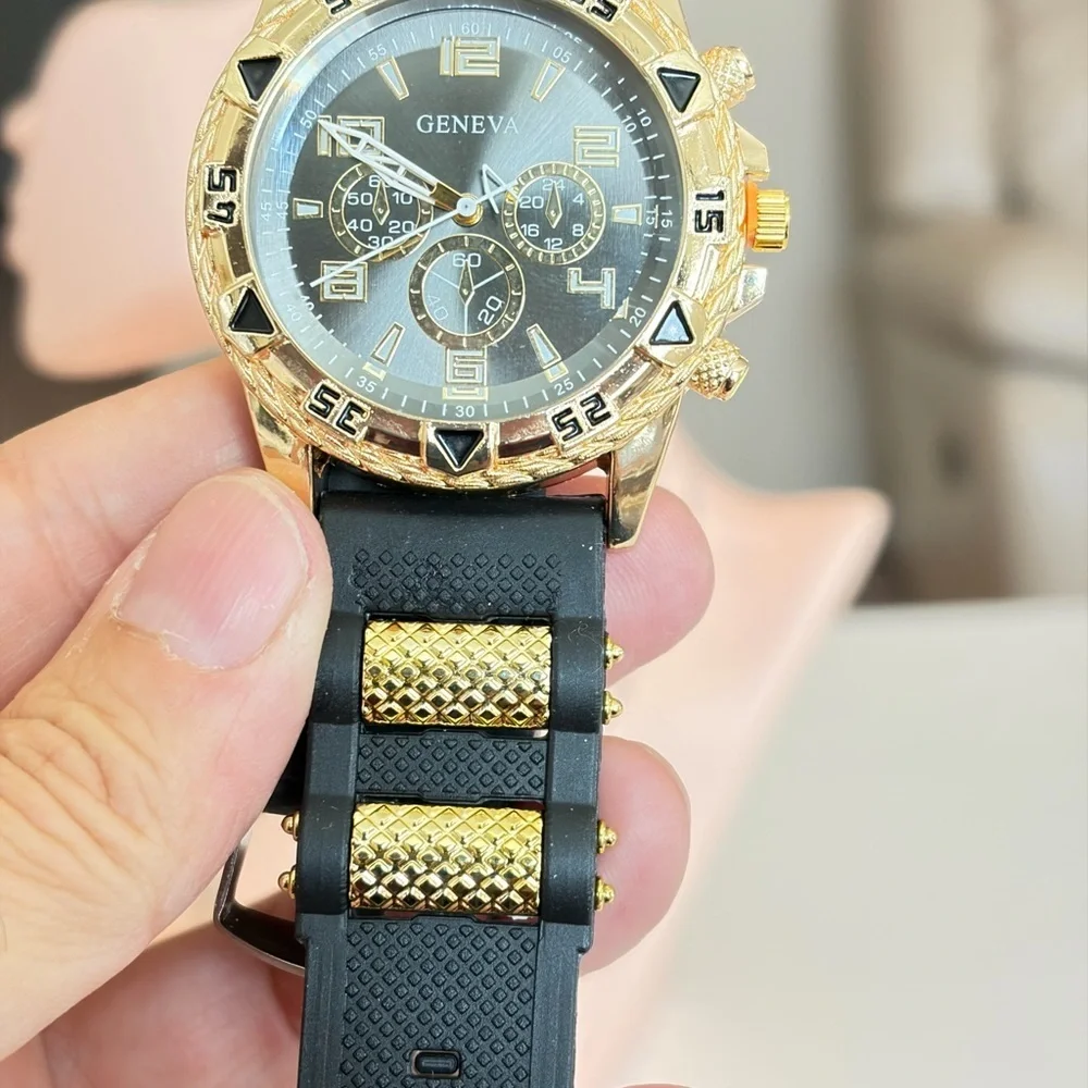 Geneva Black Dial Gold Bezel Watch.